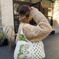 Sac upcyclé matelassé blanc à motifs verts