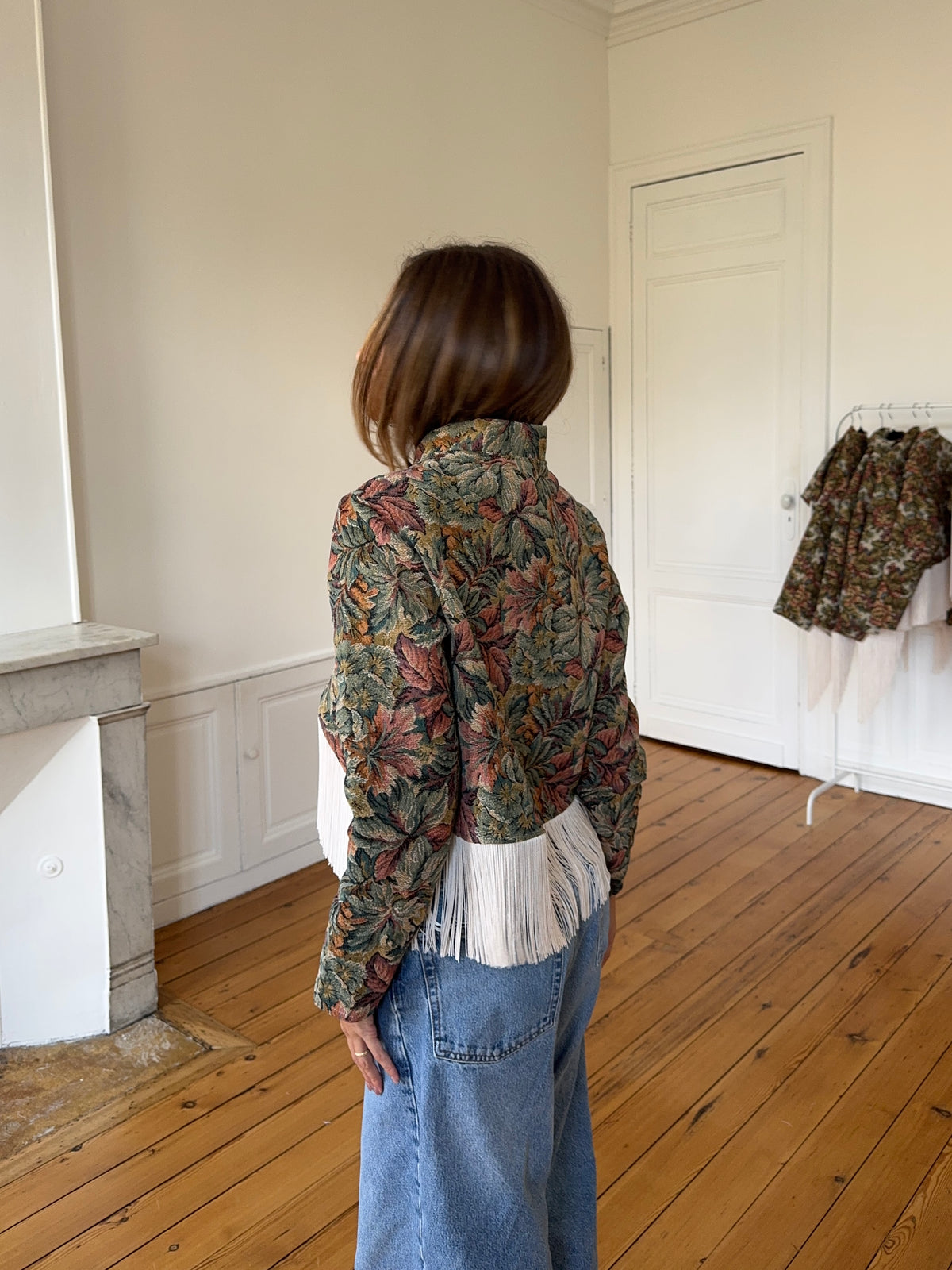 Upcycled patterned cropped jacket with fringe