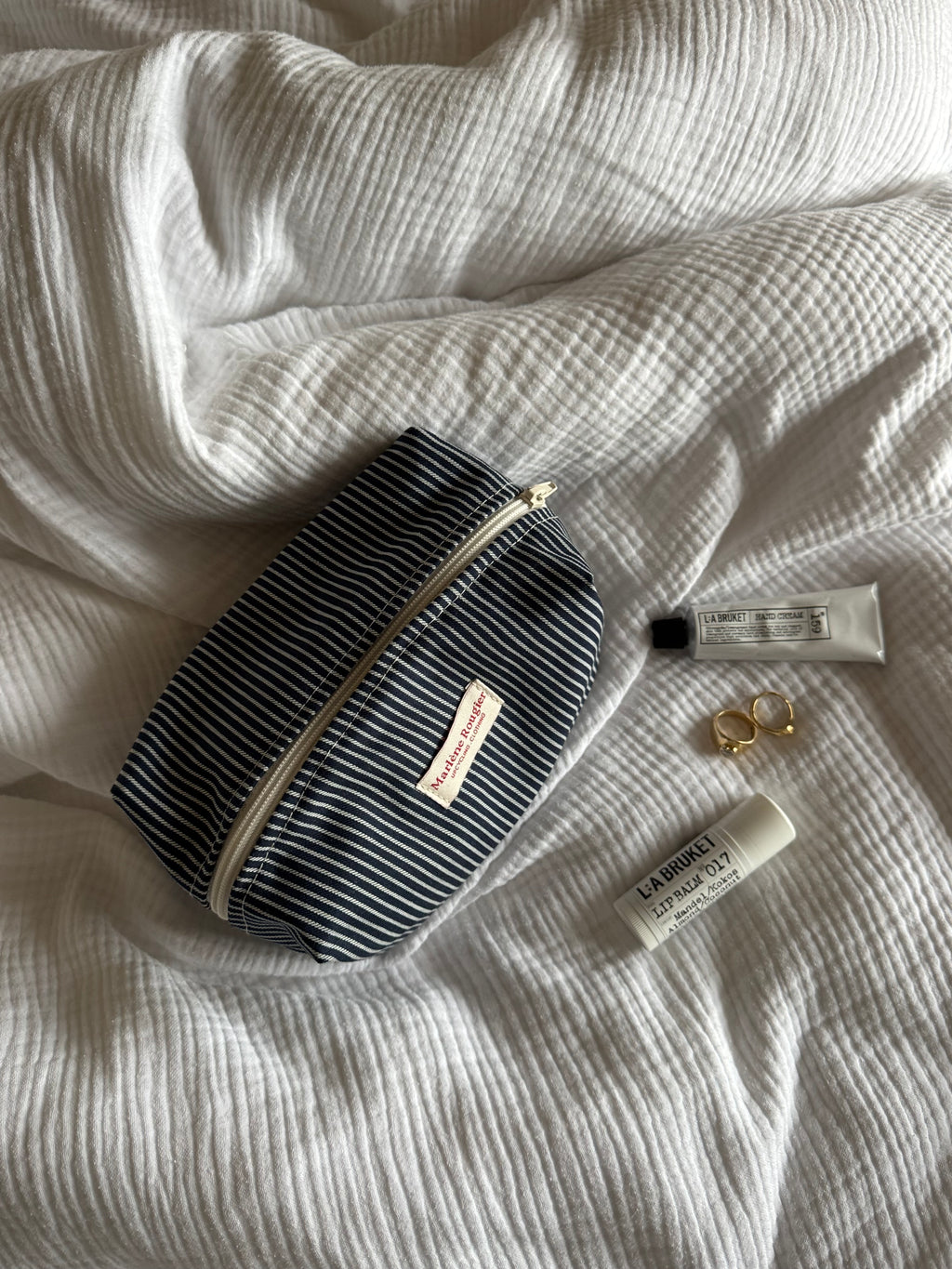 Trousse denim à rayures