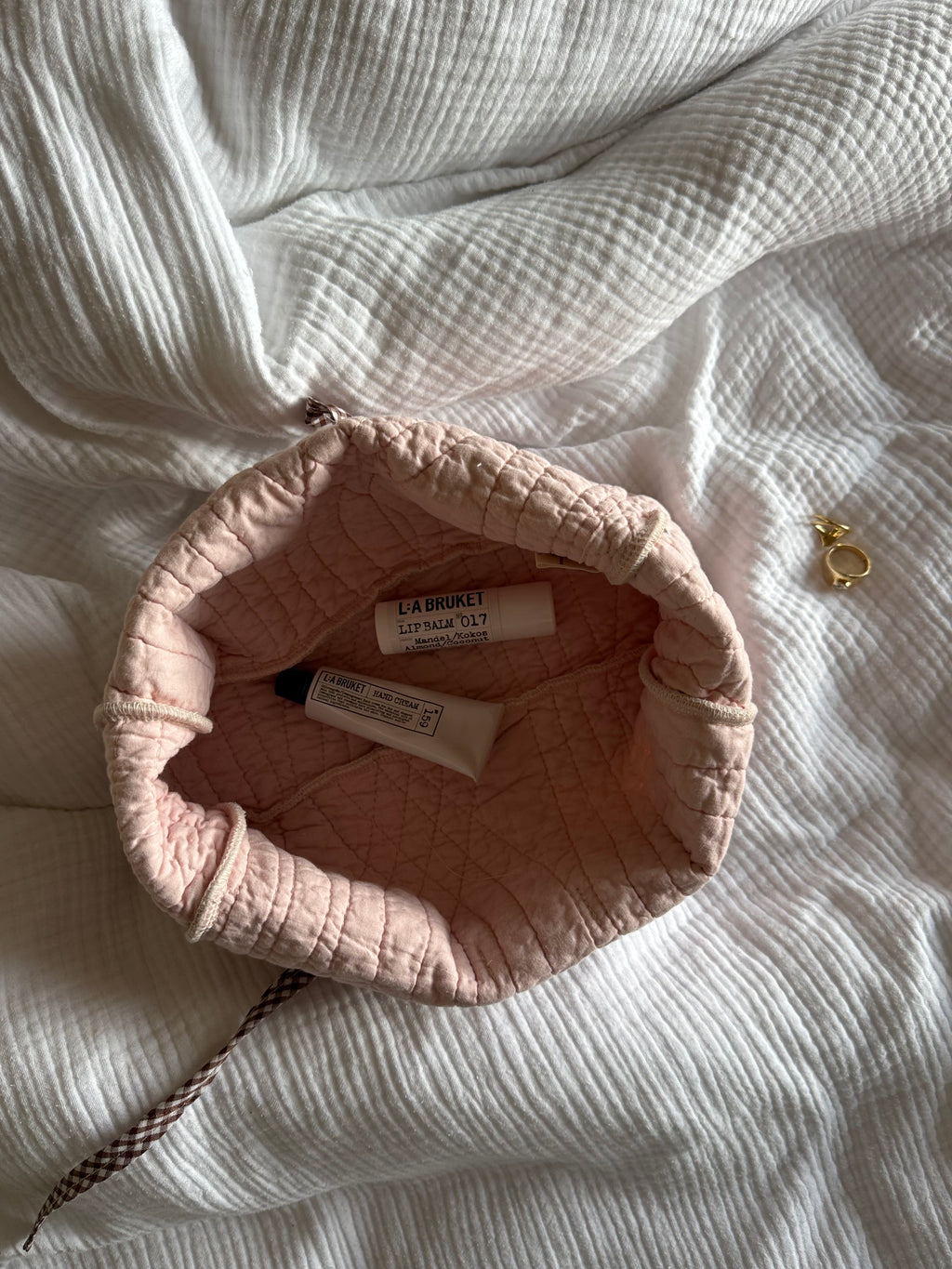 Trousse upcyclée matelassée rose clair