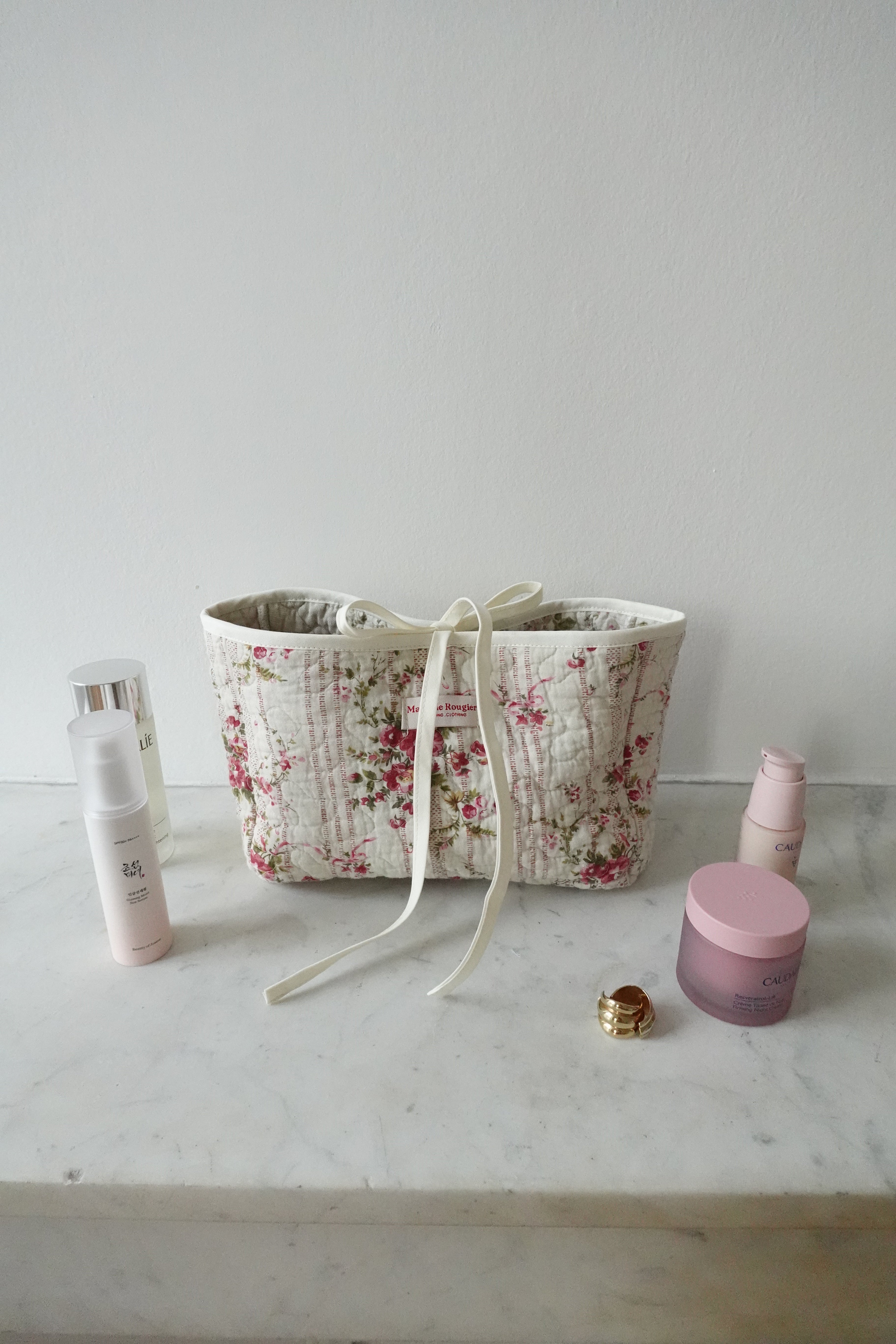 Trousse upcyclée matelassée beige à fleurs