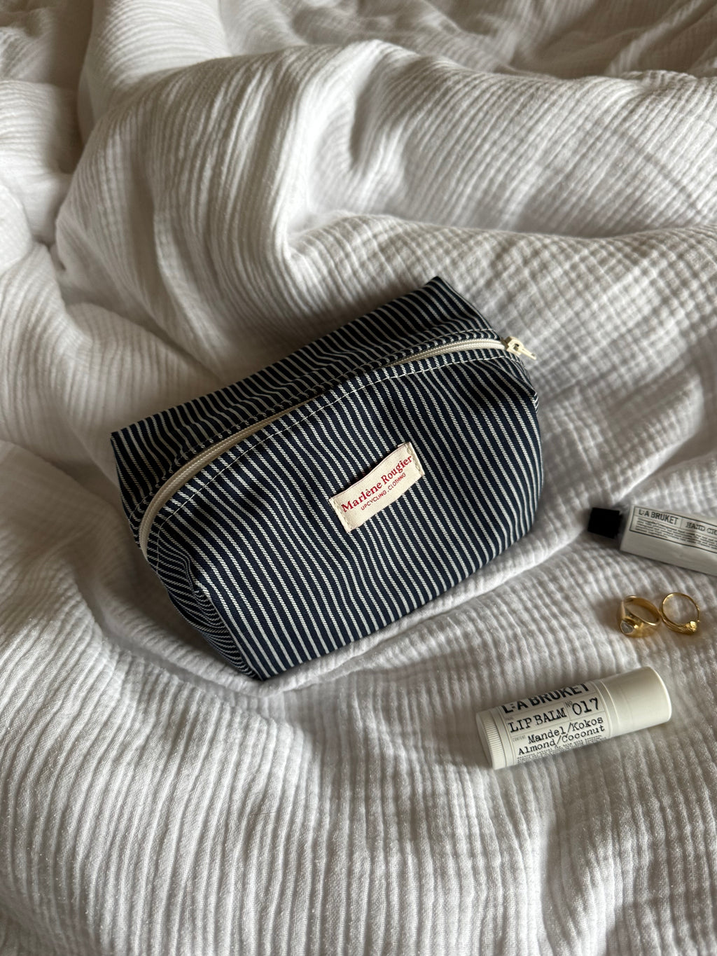 Trousse denim à rayures