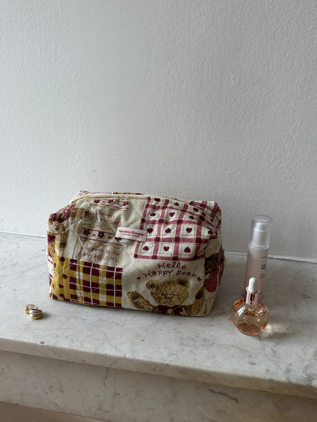 Trousse upcyclée matelassée à motifs