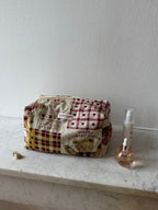 Trousse upcyclée matelassée à motifs