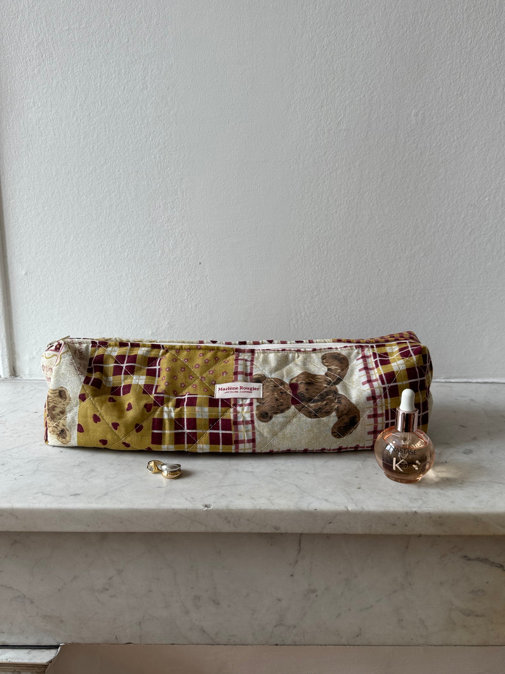 Trousse upcyclée matelassée à motifs
