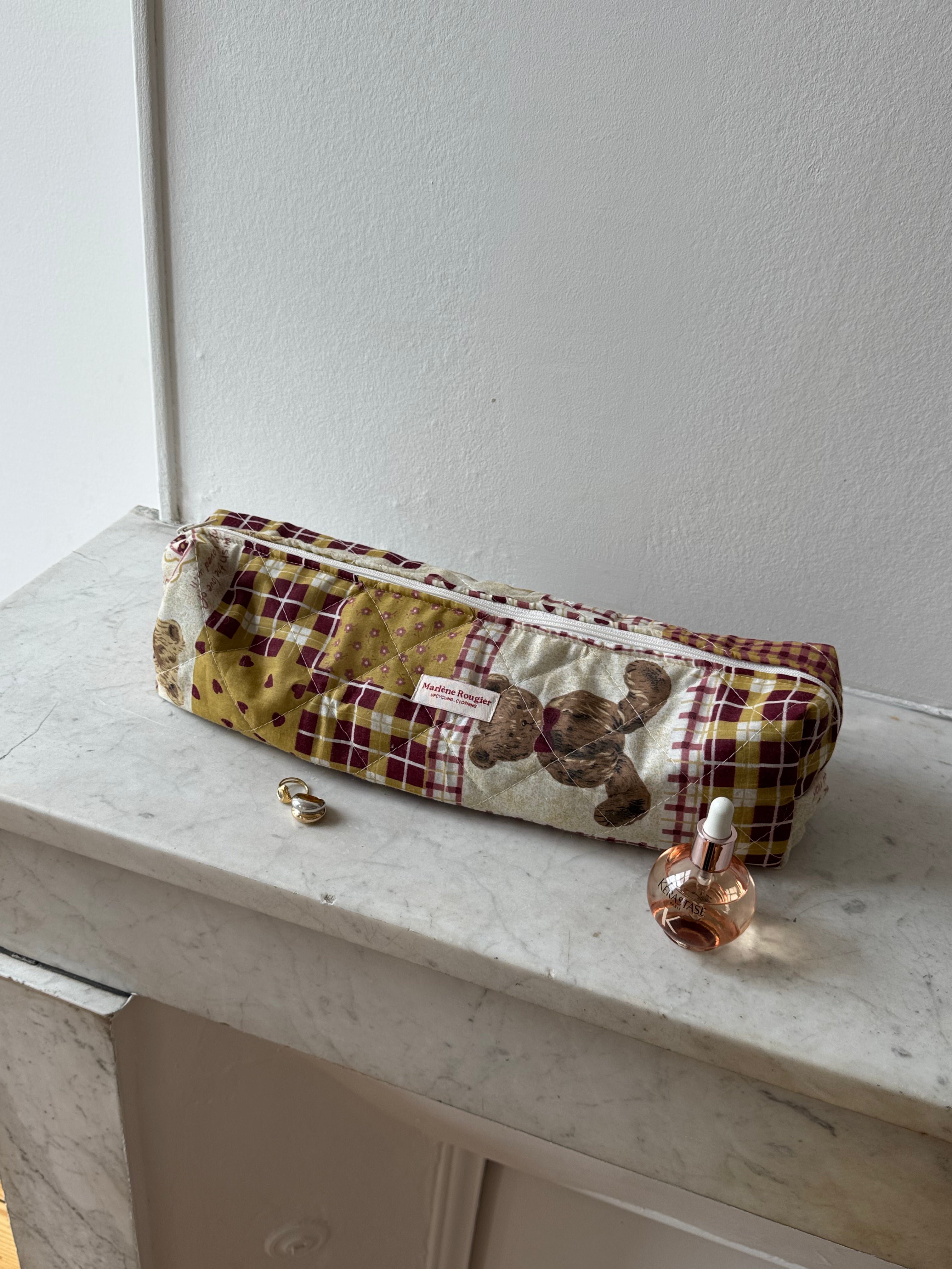 Trousse upcyclée matelassée à motifs