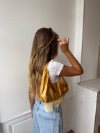Sac upcyclé satiné doré et franges