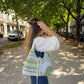 Sac upcyclé matelassé blanc à motifs verts