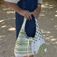 Sac upcyclé matelassé blanc à motifs verts