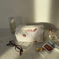 Trousse upcyclée matelassée blanche à motif