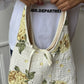 Sac upcyclé matelassé blanc à fleurs jaunes
