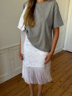 Jupe longue upcyclée satinée blanche et franges