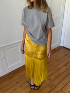 Jupe longue upcyclée satinée jaune et franges