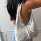 Sac upcyclé matelassé blanc à motifs