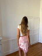 Jupe upcyclée satinée rose clair et franges