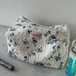 Trousse upcyclée matelassée blanche à fleurs