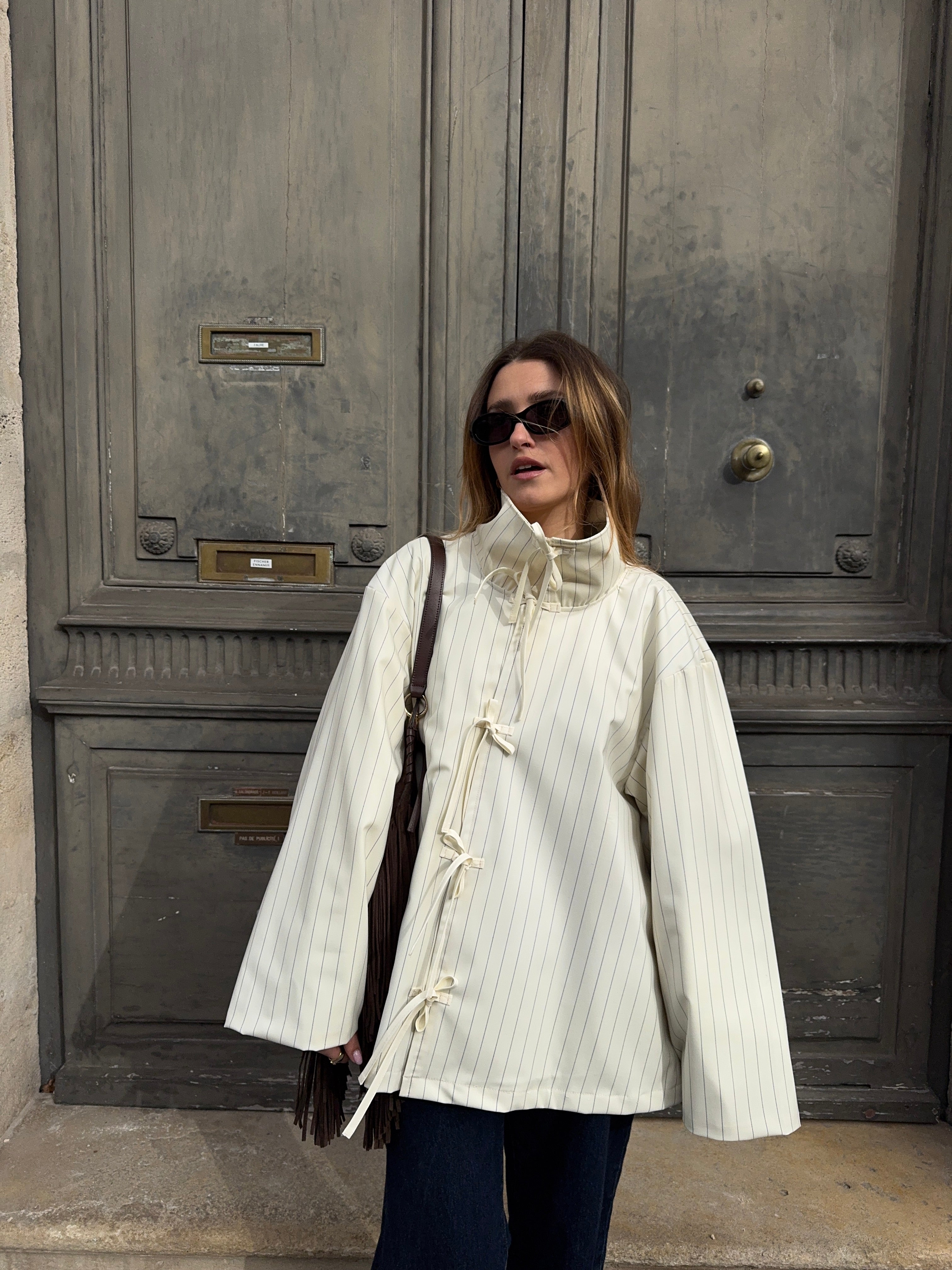 Veste écrue à fines rayures bleues