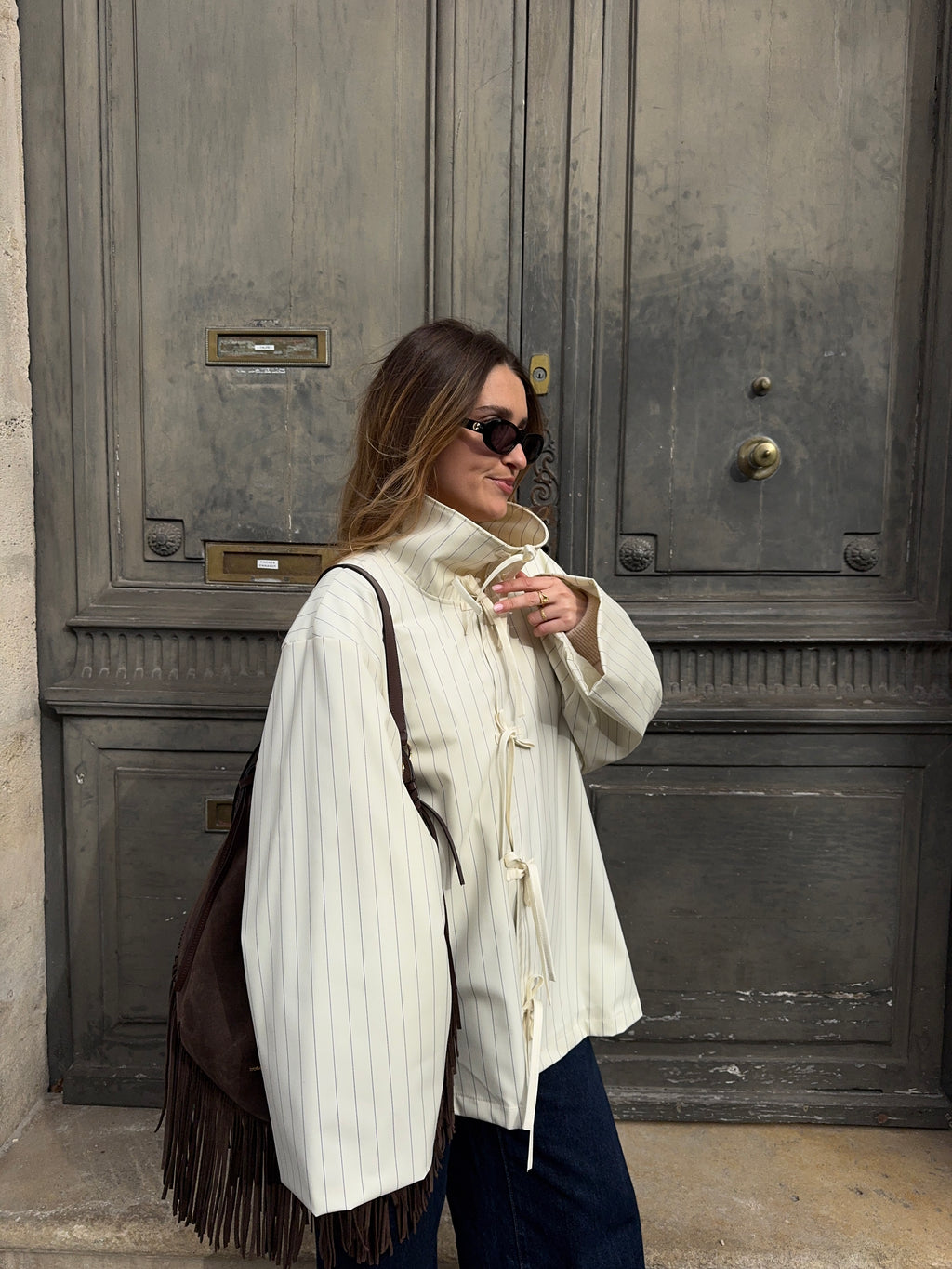 Veste écrue à fines rayures bleues