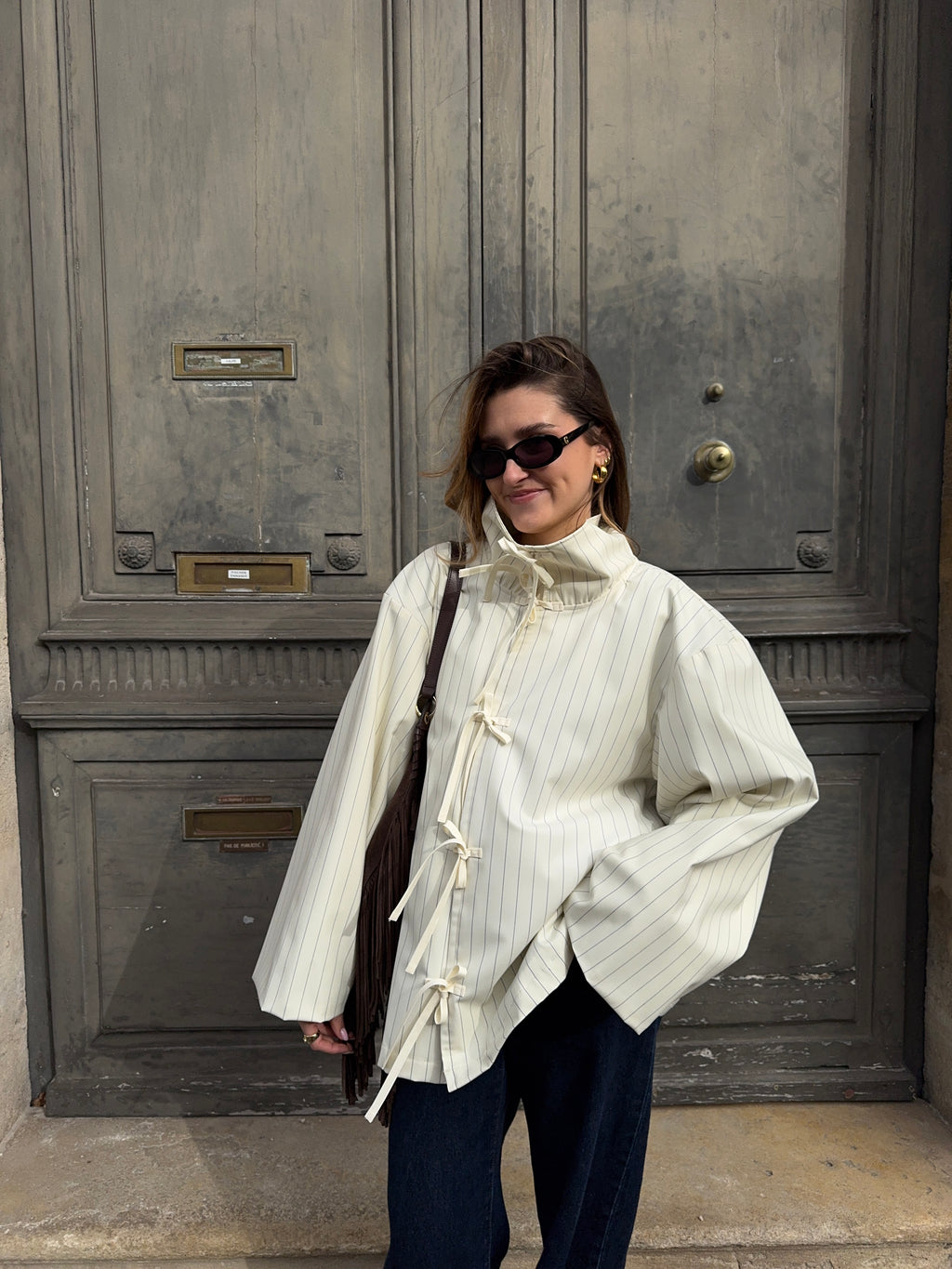 Veste écrue à fines rayures bleues