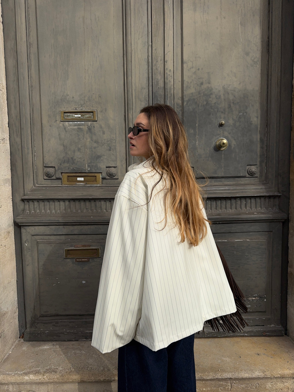 Veste écrue à fines rayures bleues