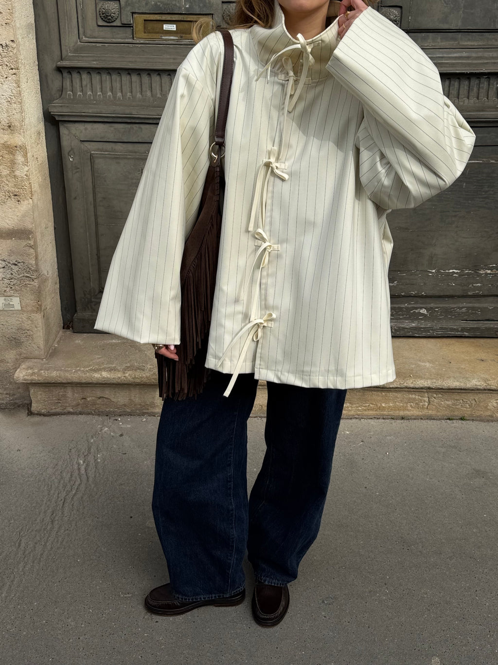 Veste écrue à fines rayures bleues