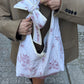 Sac upcyclé matelassé nœud blanc à motifs