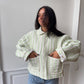 Veste upcyclée matelassée vert clair et motifs