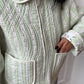 Veste upcyclée matelassée vert clair et motifs