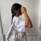 Sac upcyclé matelassé blanc à fleurs violettes
