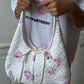 Sac upcyclé matelassé blanc à fleurs violettes
