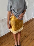 Jupe upcyclée satinée dorée et franges