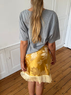 Jupe upcyclée satinée dorée et franges