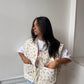 Veste sans manches upcyclée écru à fleurs
