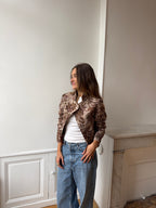 Veste courte upcyclée à motifs et franges